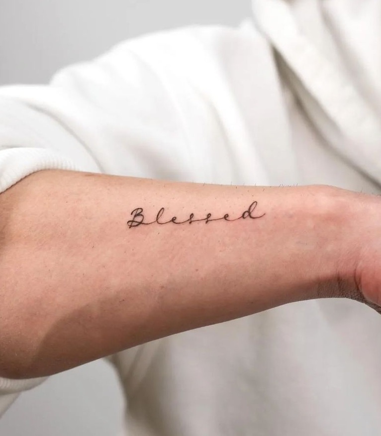 Amour Tattoo - Blessed fine line lettering arm tattoo. Done by: Mimi Ink |  Facebook