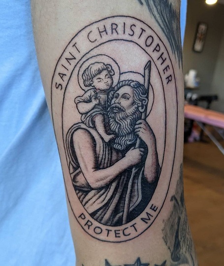 Unique Catholic Sleeve Tattoo Idea