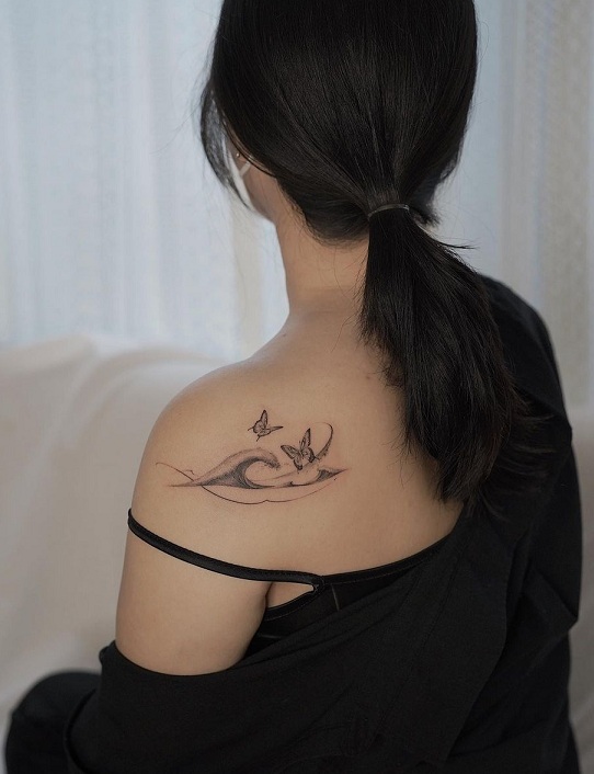 Wave Tattoo With Butterflies Near The Shoulder