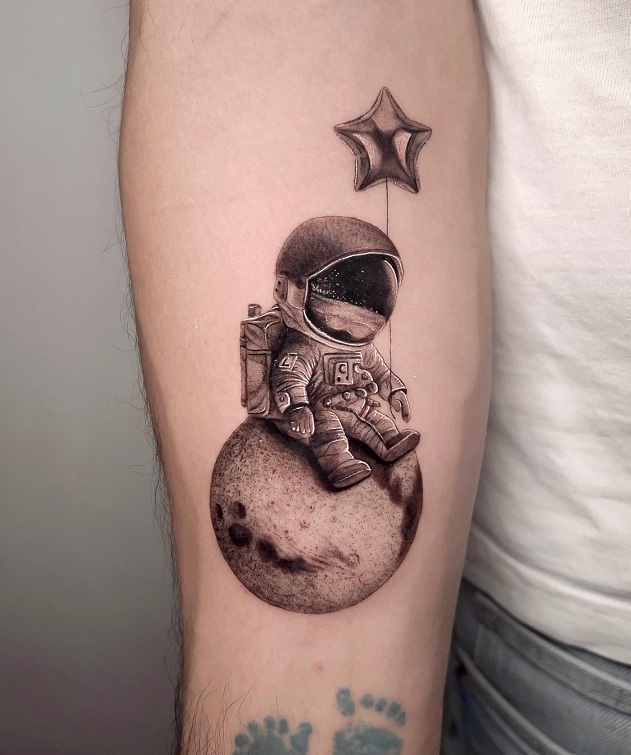 Cute Astronaut On The Moon Tattoo
