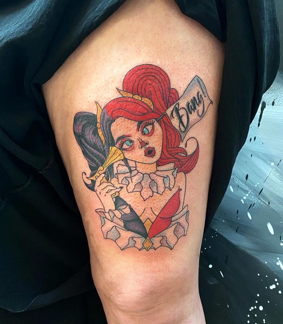 Funny Harley Quinn Tattoo Design On The Bicep