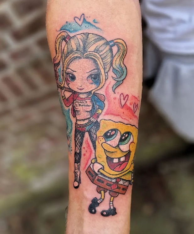 Harley Quinn And Sponge Bob Tattoo On The Arm