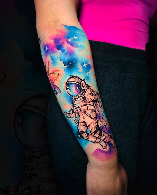 Watercolour Astronaut Tattoo On Forearm