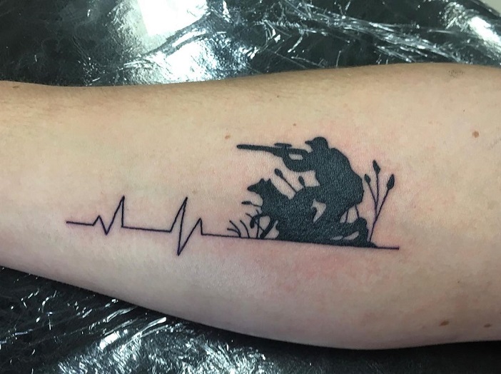 Bold Hunting Tattoo With A Heartbeat