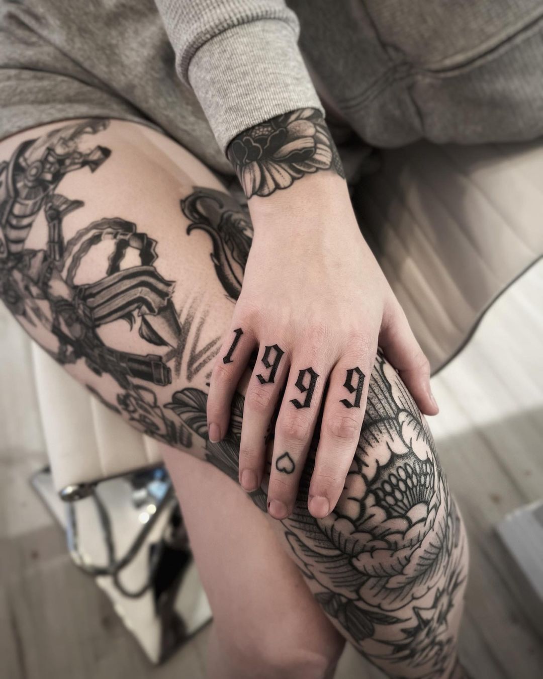 '1999' Bold Year Knuckle Tattoos