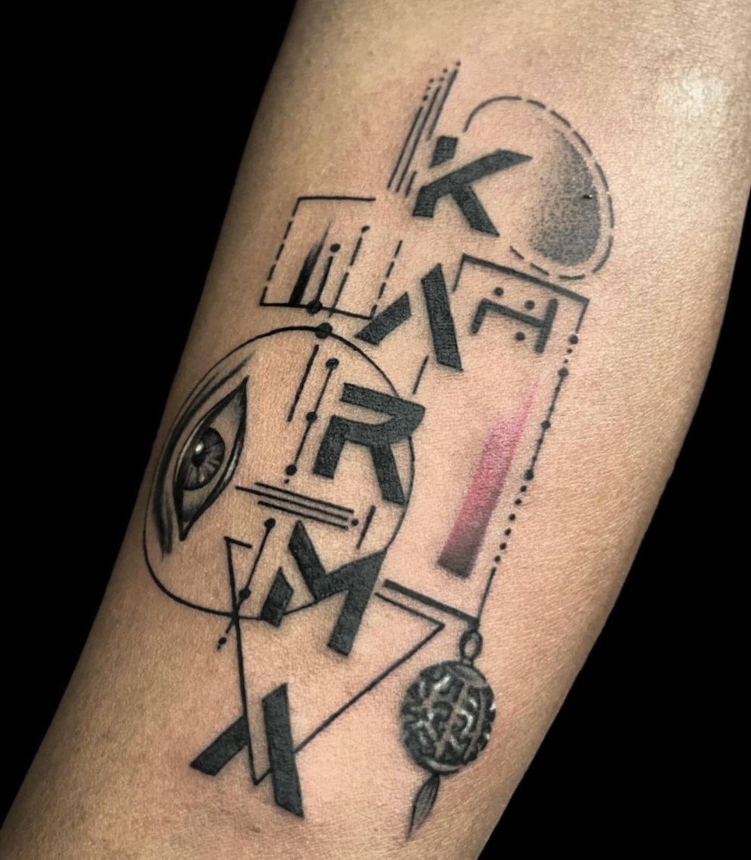 Abstract Geometric Karma Tattoo On Arm