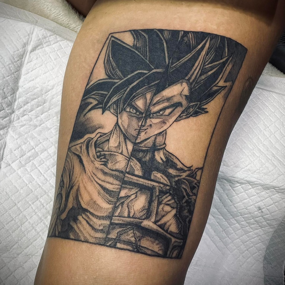 Bold Black Ink Dragon Ball Goku Tattoo