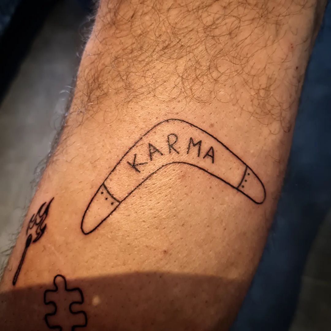 Boomerang Karma Symbol Tattoo Design
