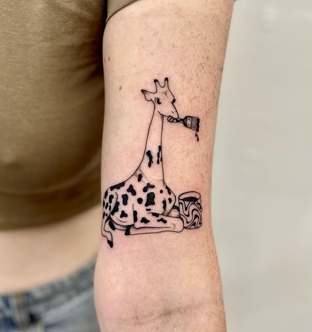 Cartoon Giraffe Arm Tattoo