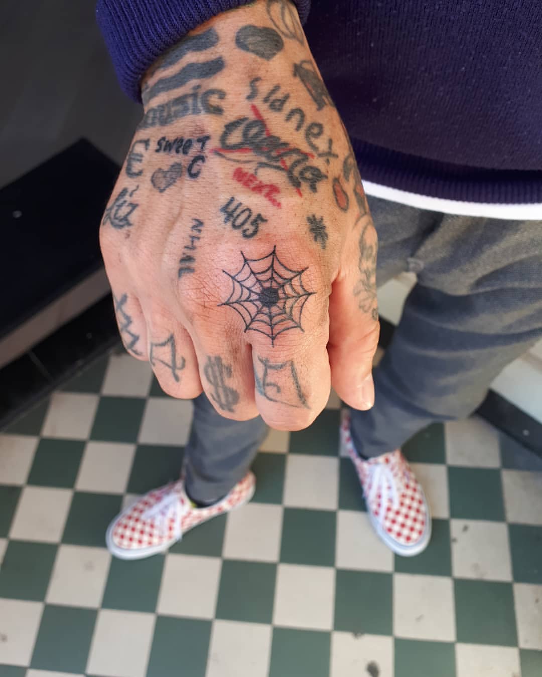 Eclectic Mix Of Knuckle And Hand Tattoos