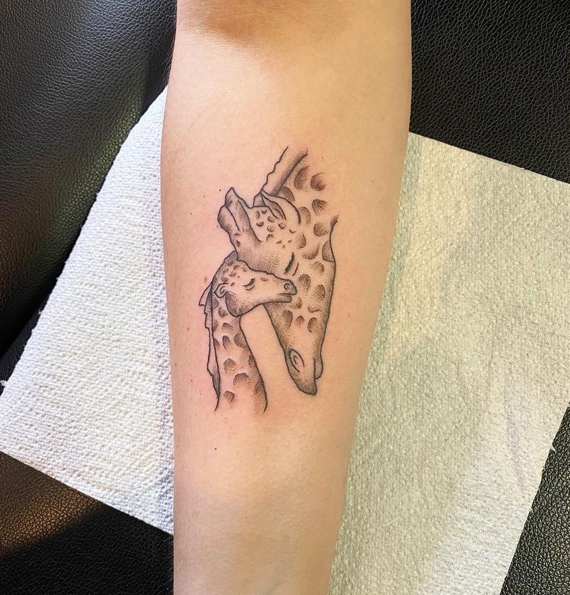 Giraffe Family Arm Tattoo