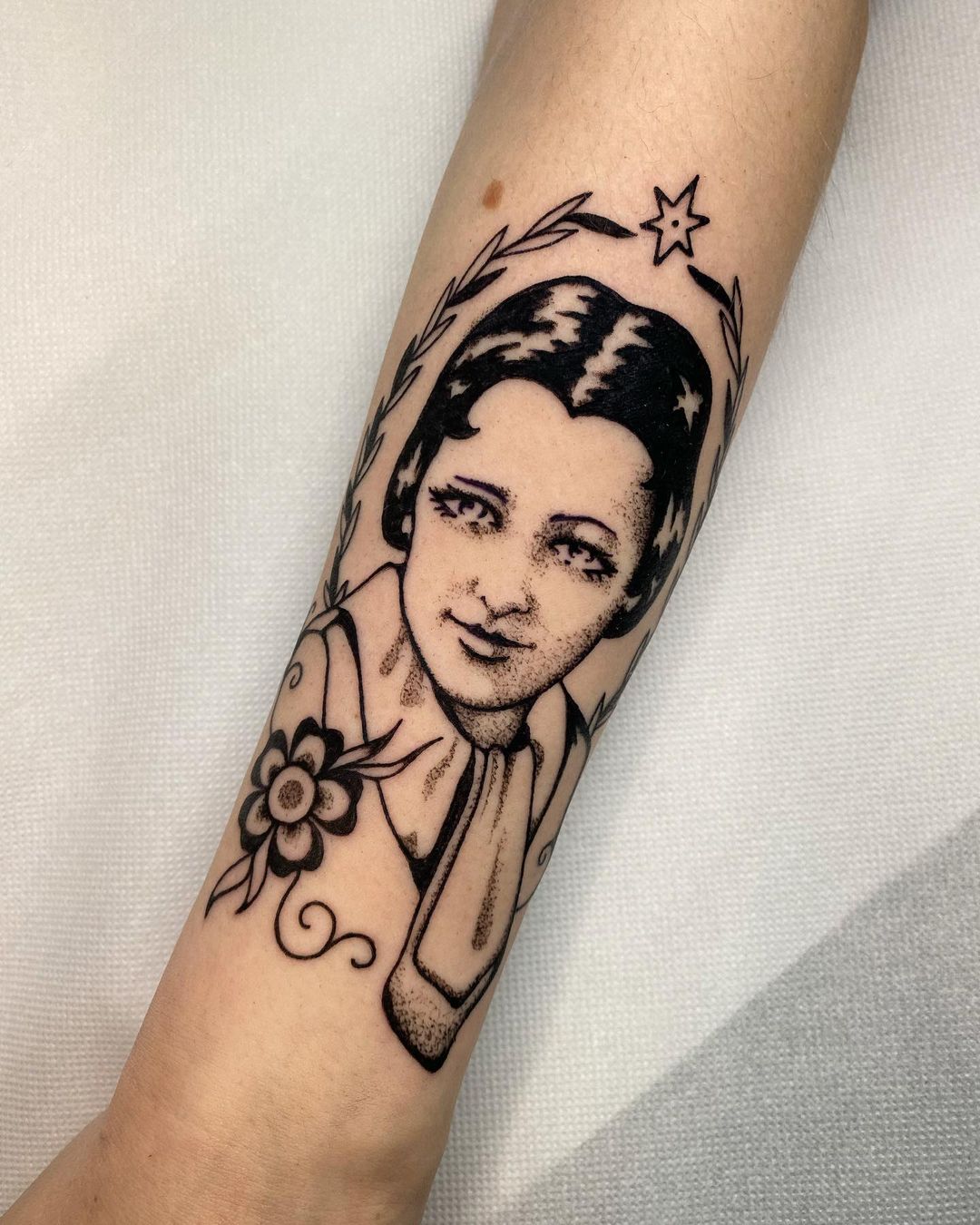 Grandmother's Portrait With Floral Accents Tattoo