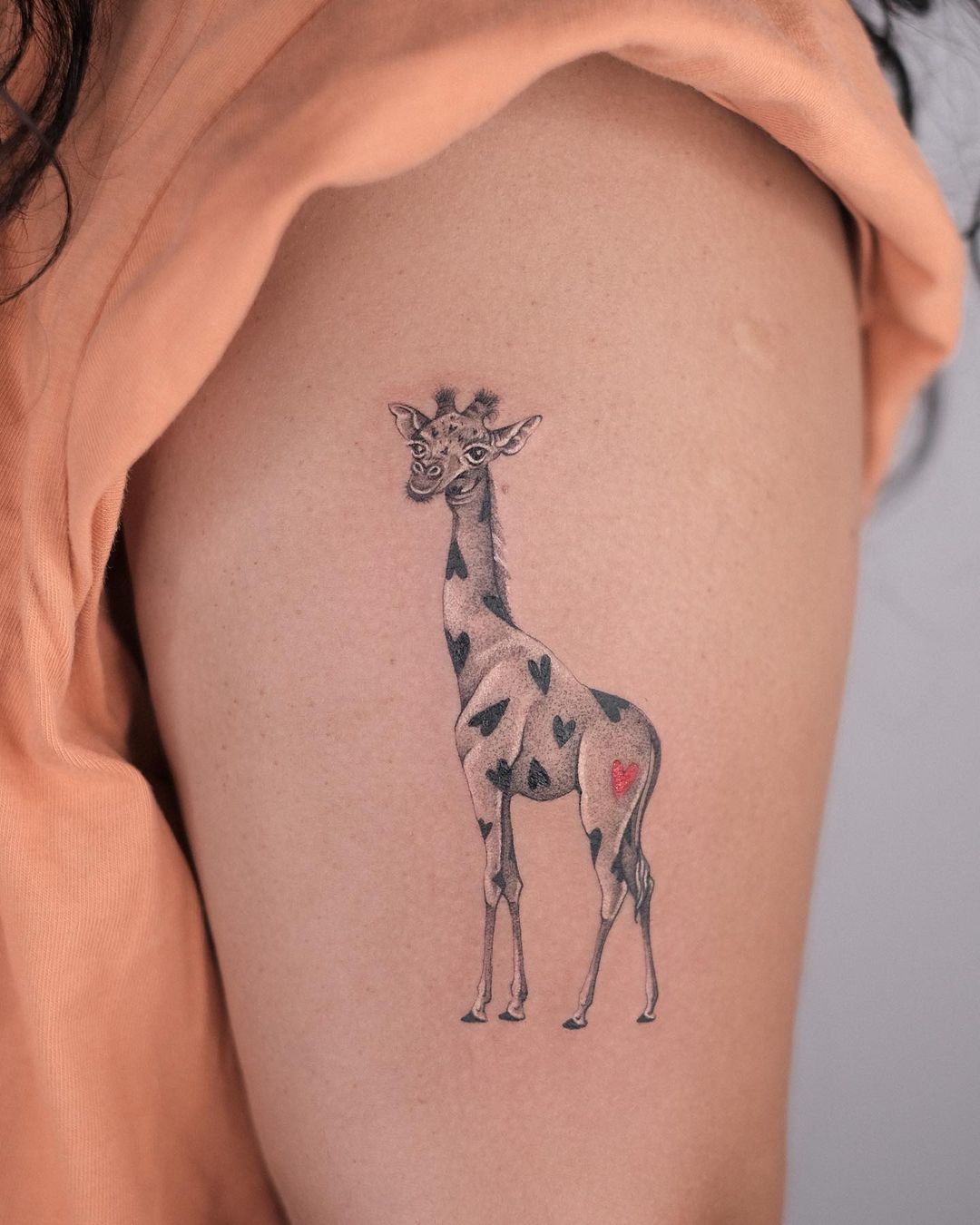 Heartfelt Giraffe Tattoo