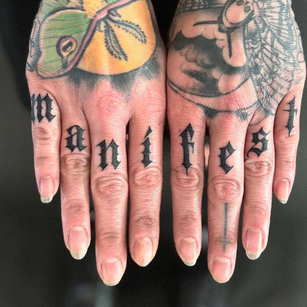 'manifest' Knuckle Tattoo In Gothic Font