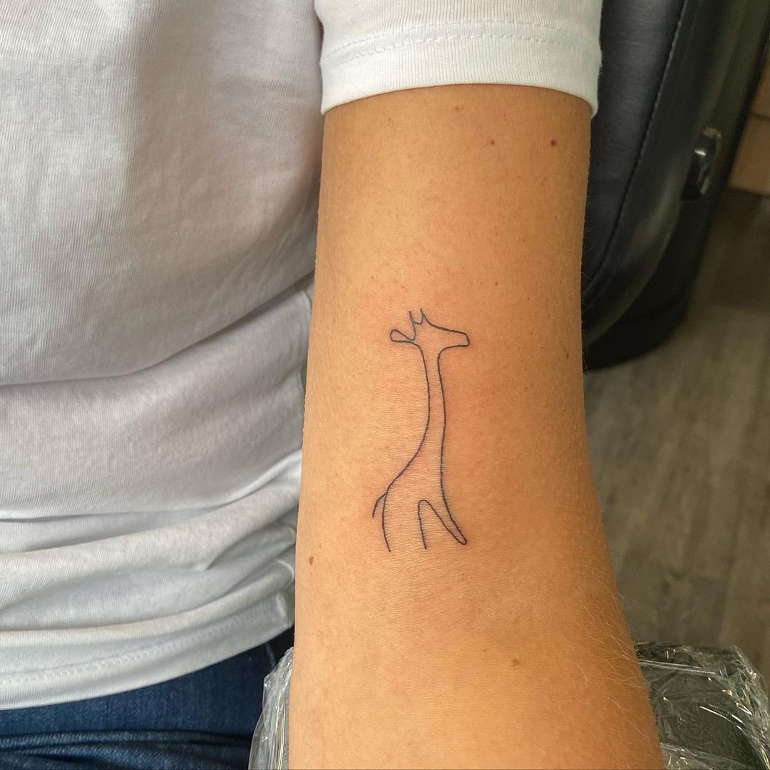 Minimalist Giraffe Arm Tattoo