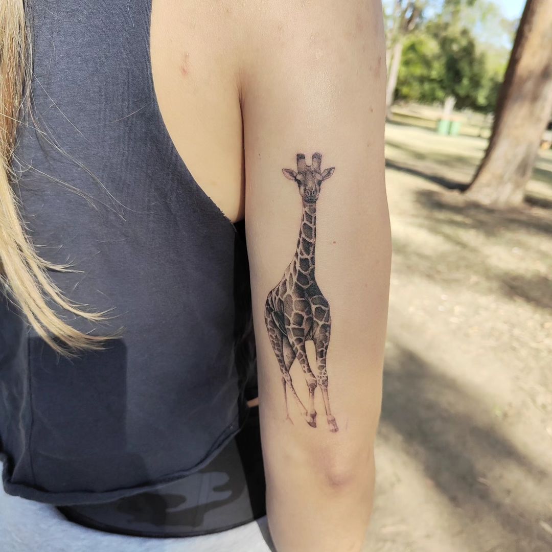 Minimalist Giraffe Tattoo On Arm