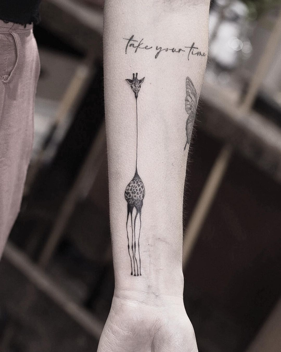 Minimalist Giraffe And Quote Tattoo