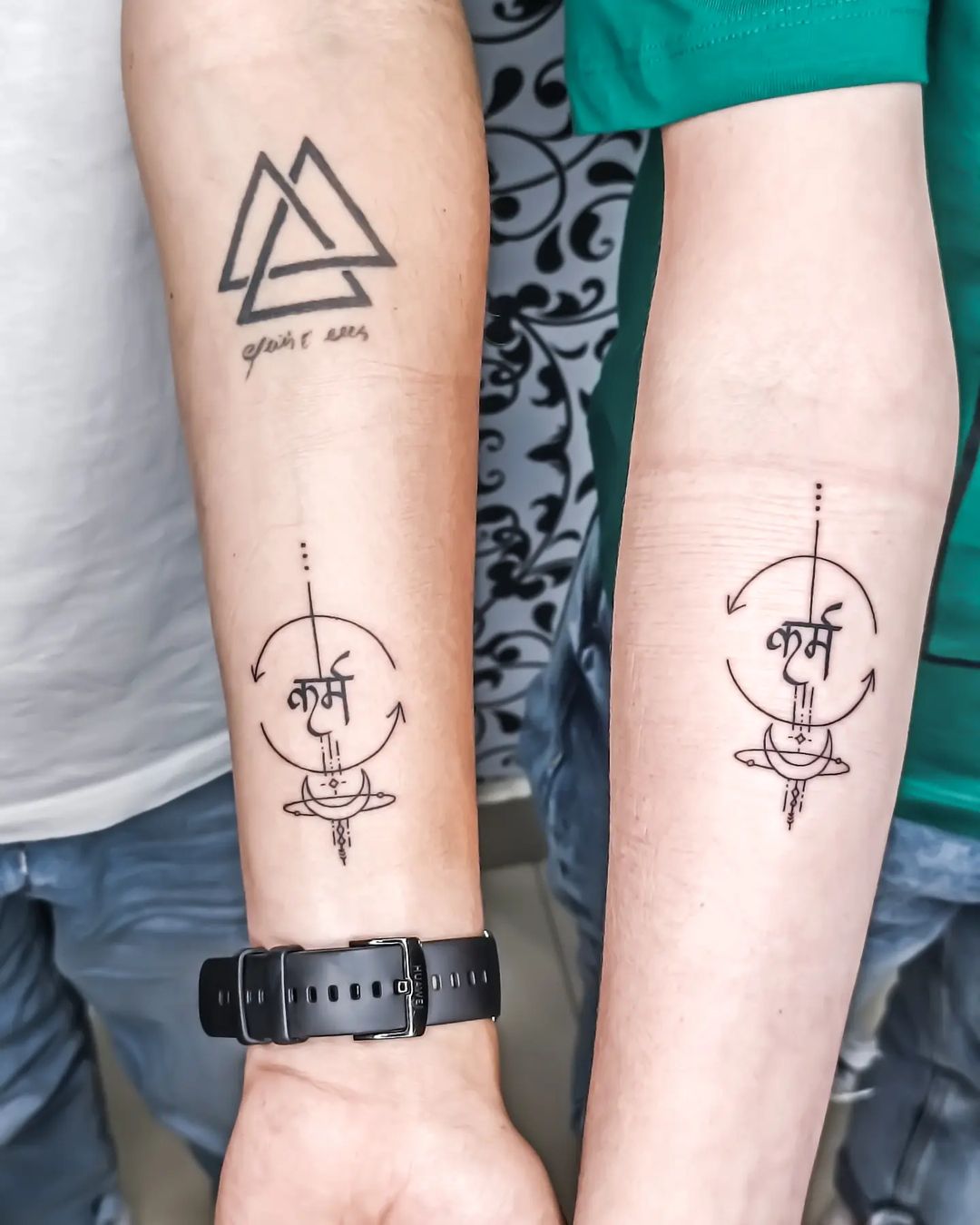 Minimalist Karma Arrows Tattoo