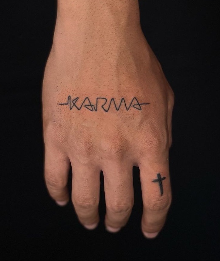 Minimalist Karma Hand Tattoo