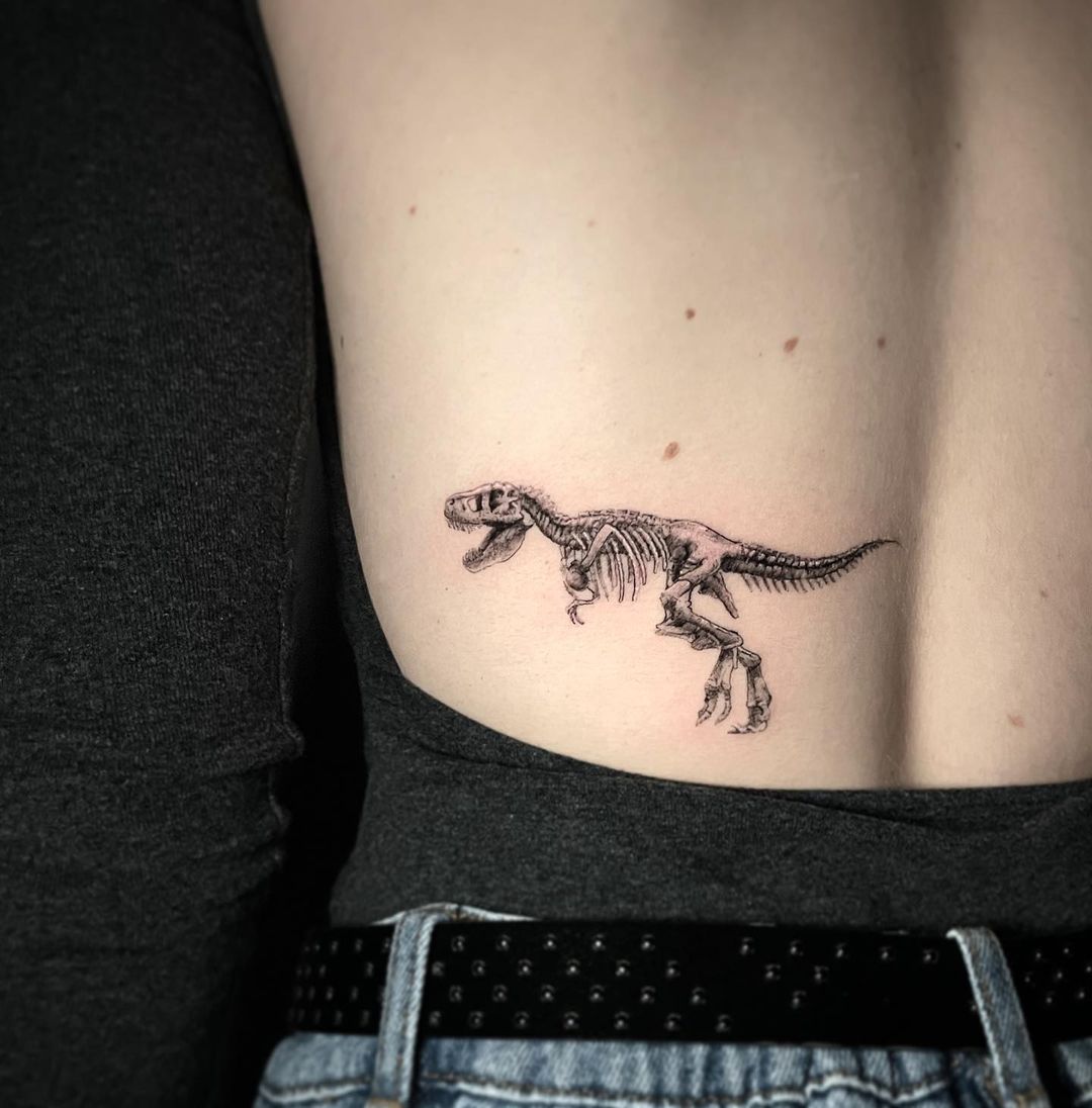Minimalist T Rex Rib Tattoo