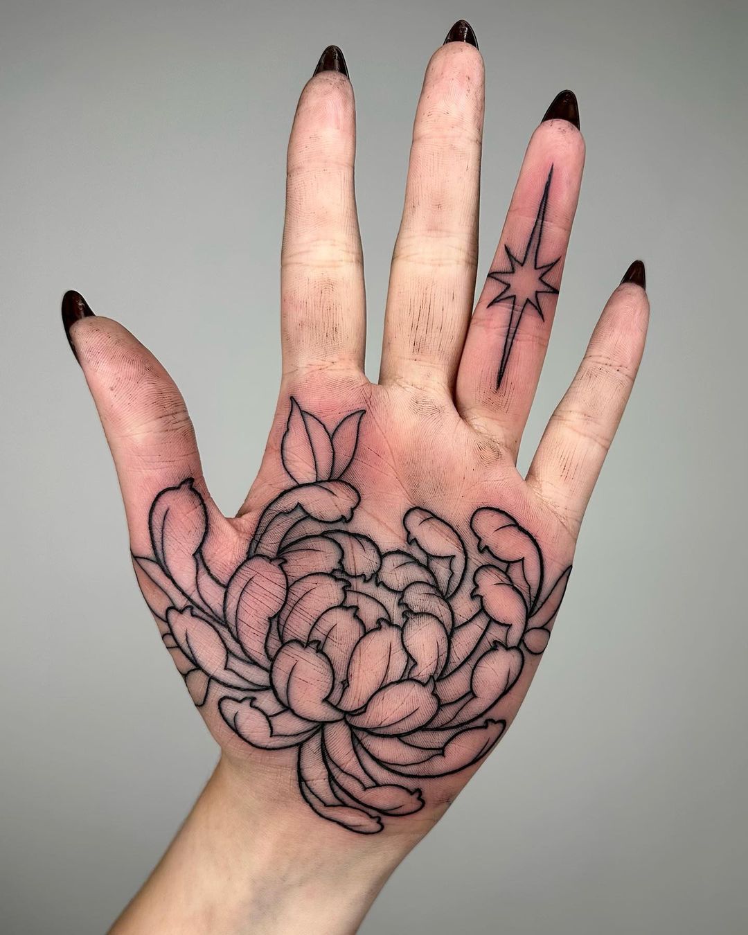 squigglysqualor did up a chrysanthemum elbow piece to add to the floral  theme 🌼You can spot some of her healed work, a few irises, ju... |  Instagram