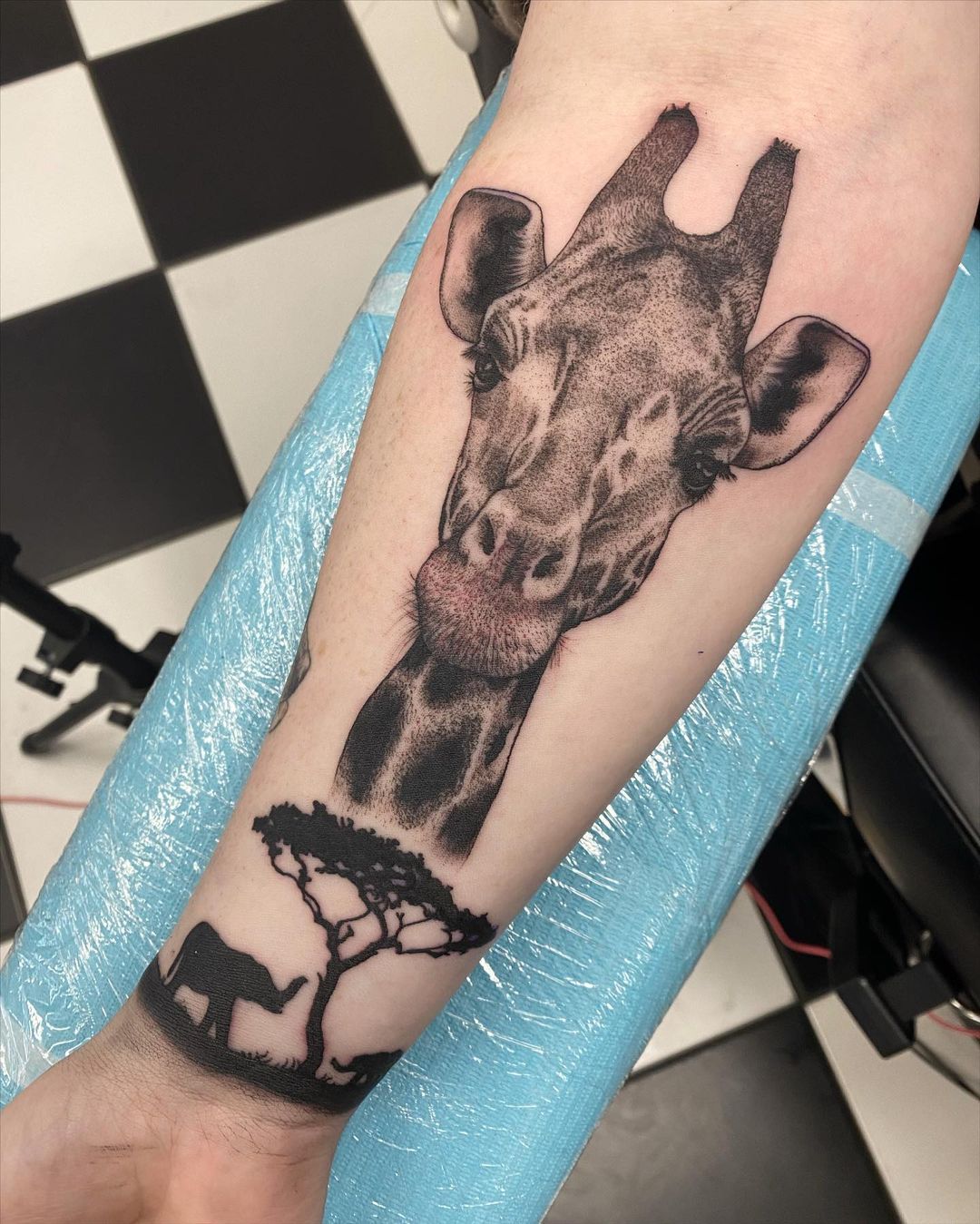 Realistic Giraffe Portrait Arm Tattoo