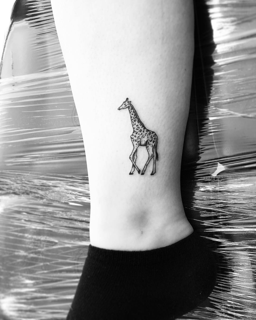 Simple Giraffe Ankle Tattoo