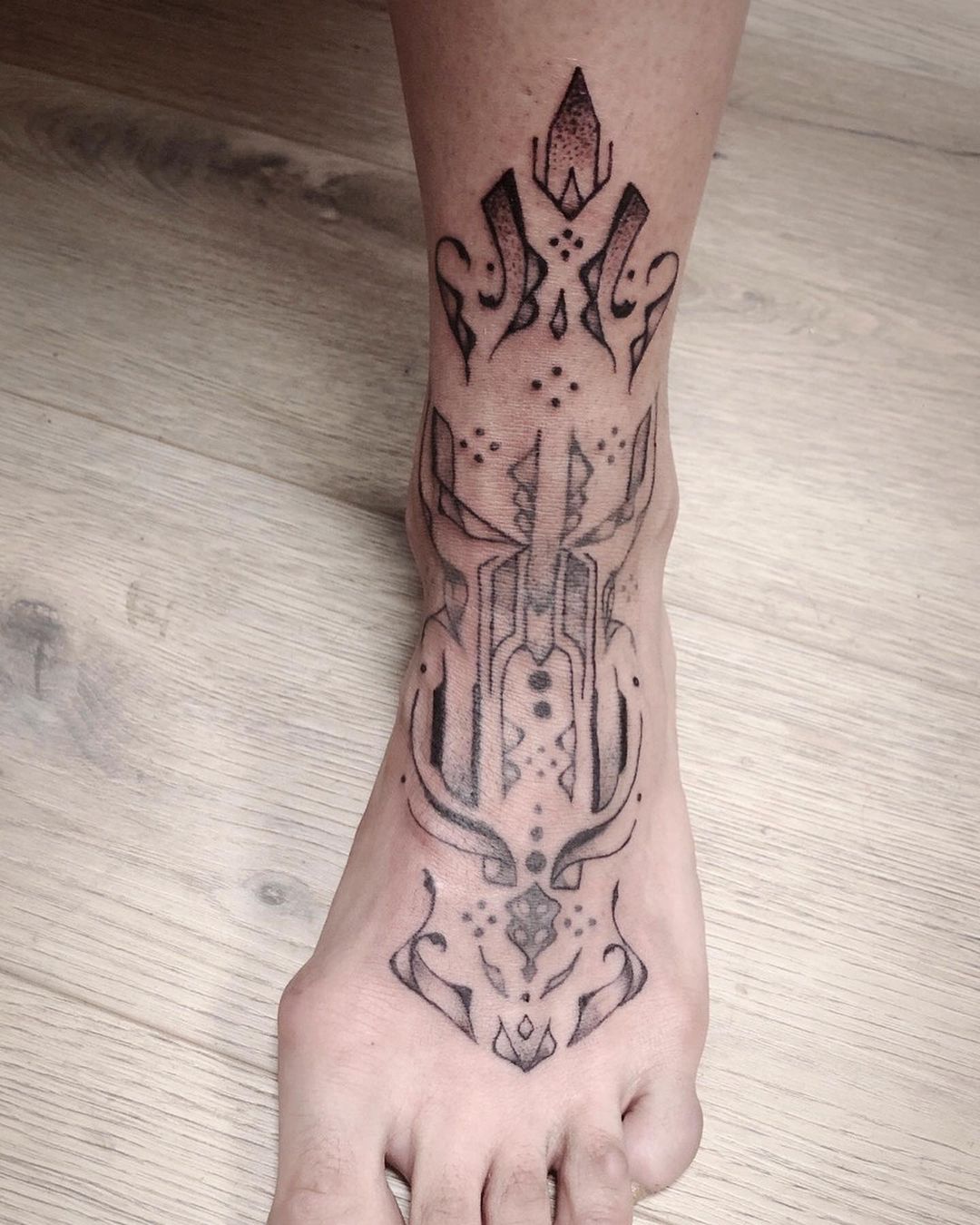 Stylised Skullon Foot Cyberpunk Tattoo