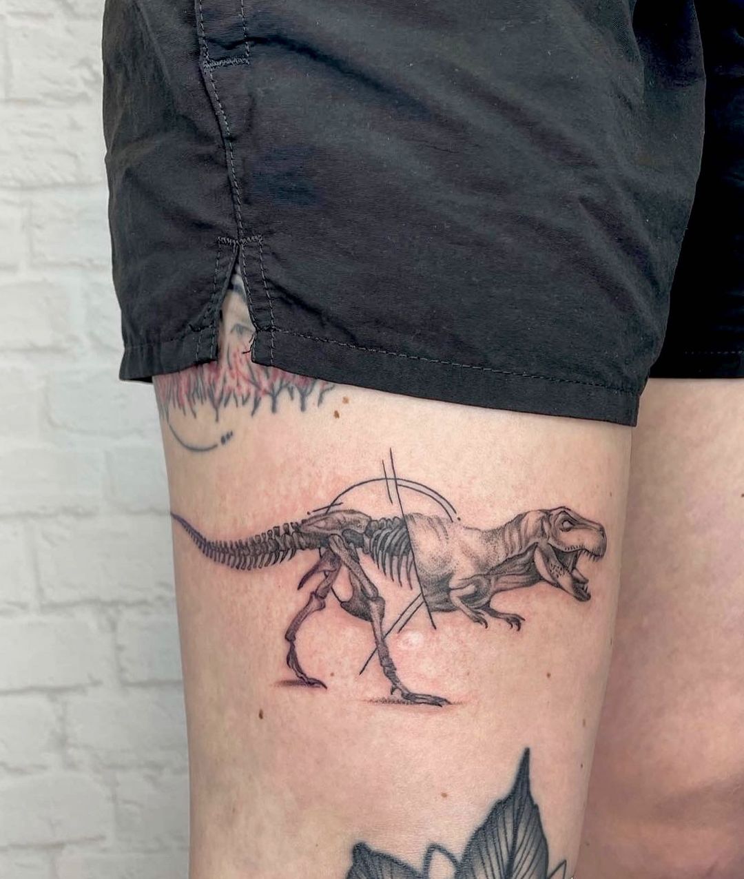 T Rex Skeleton Thigh Tattoo