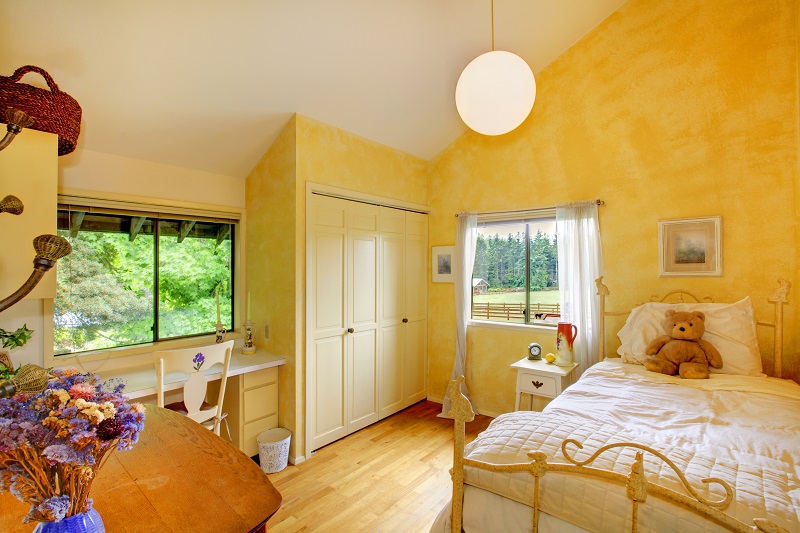 Yellow,baby,girl,bedroom,at,the,horse,ranch,in,washington