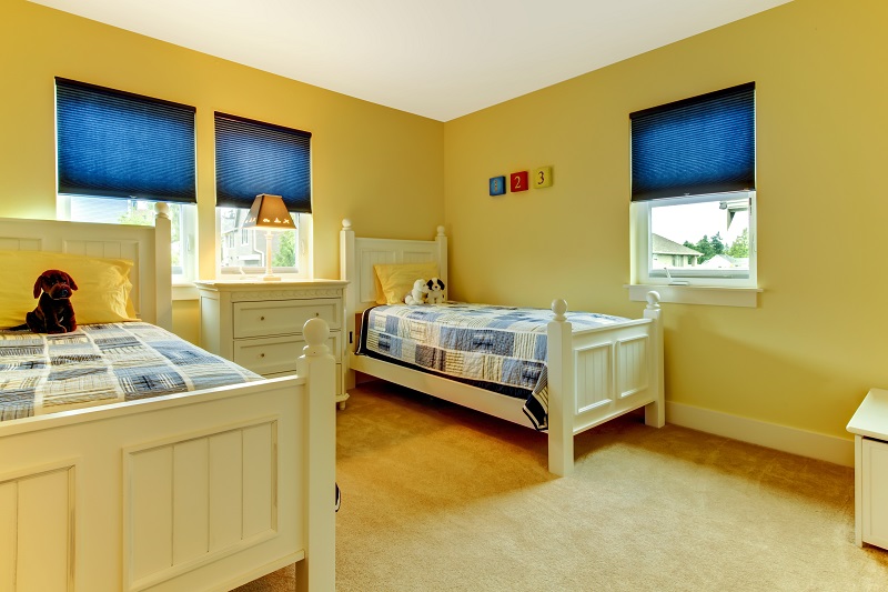 Cute,and,cozy,kids,bedroom,in,yellow,and,blue.
